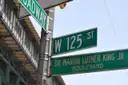The 125th Street / Martin Luther King Jr. Blvd sign in Harlem