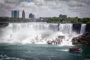 The American Falls at Niagara with a tour boat below