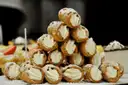 A pyramid of filled cannoli