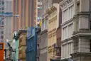 Old downtown Manhattan facades with fire escapes