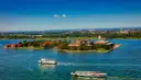Ellis Island from the air, with ferries