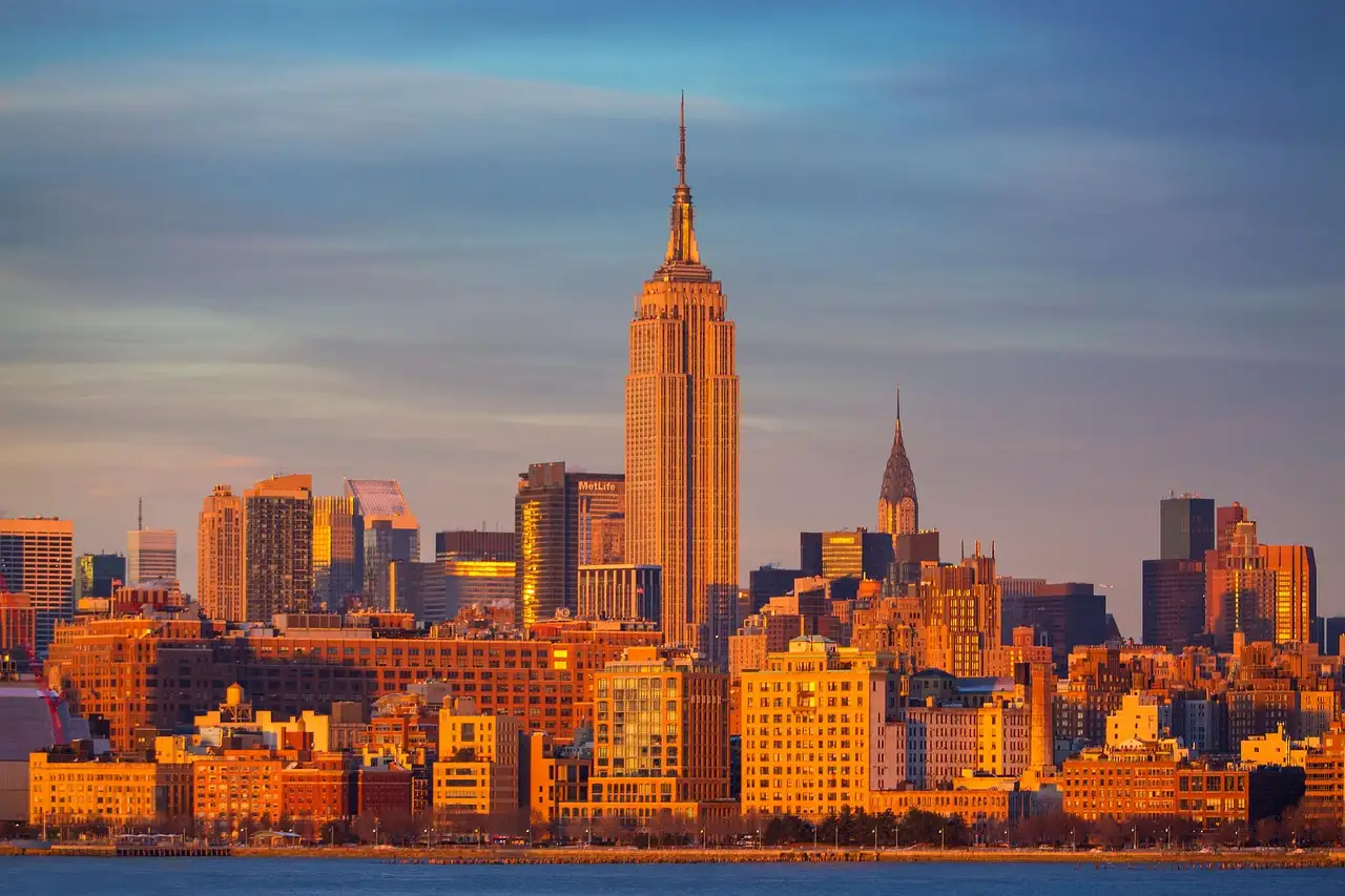 The Empire State Building glowing in golden evening light