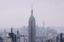 The Empire State Building above a hazy skyline