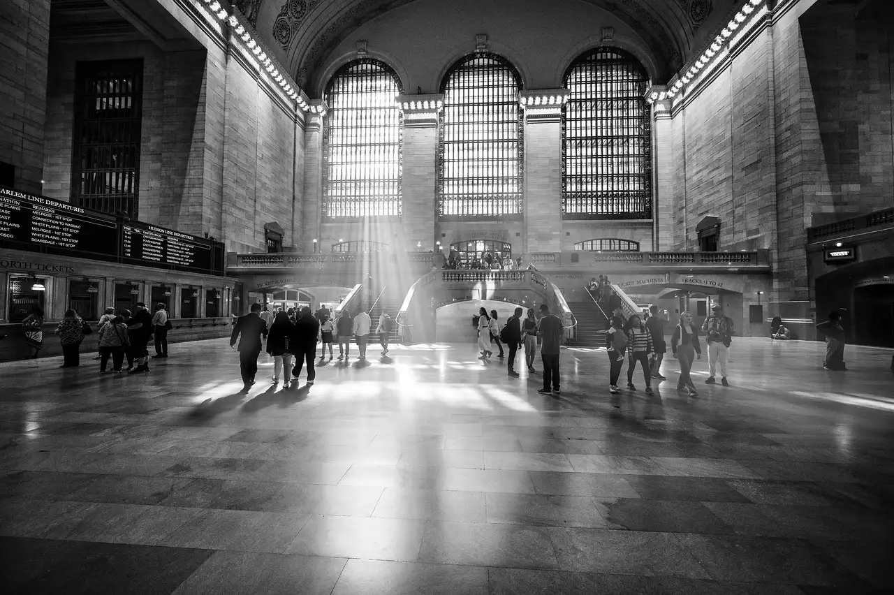 Light beams in Grand Central's concourse, in black and white