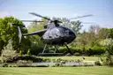 A small helicopter taking off