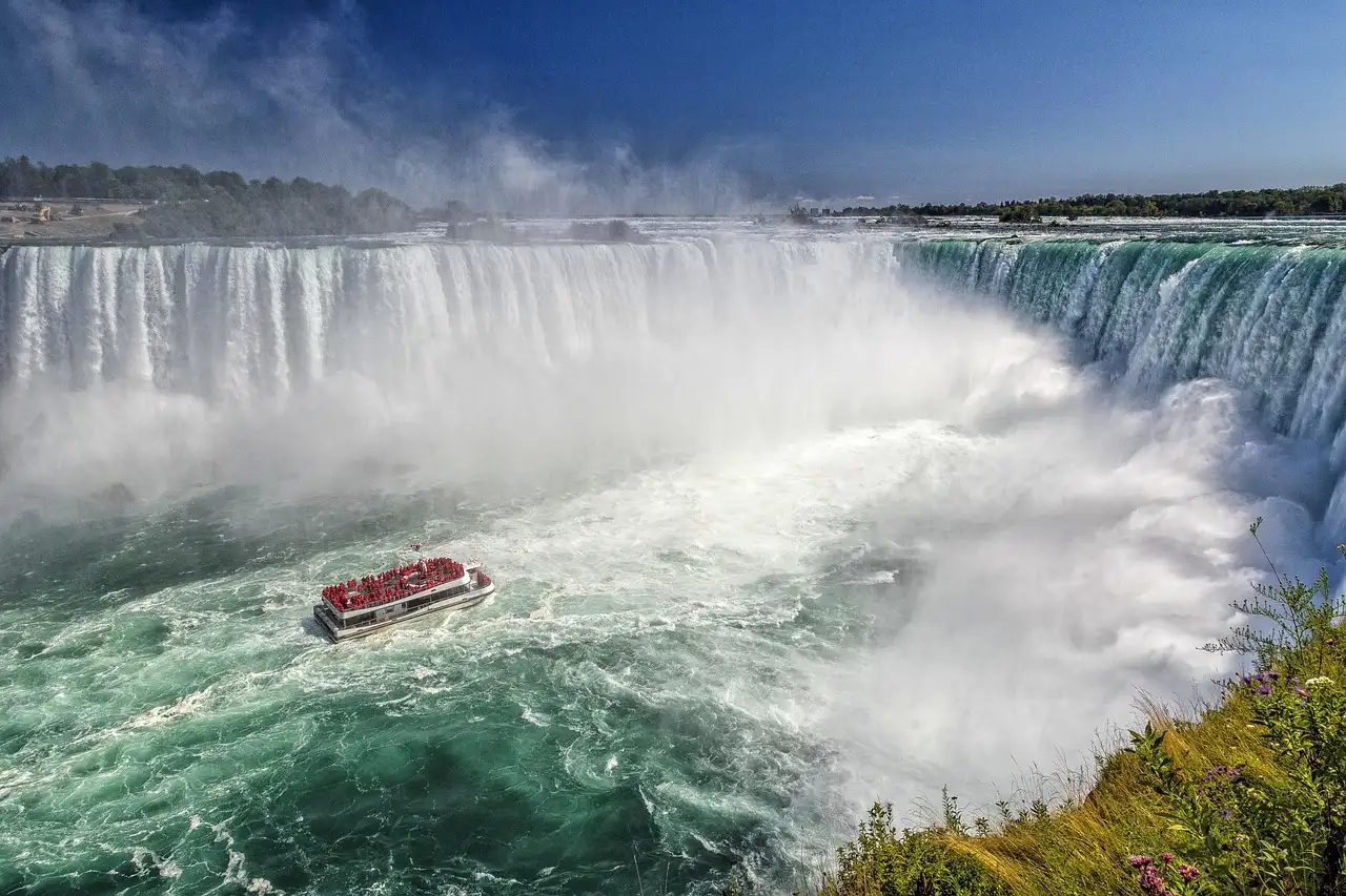 A tour boat below Horseshoe Falls at Niagara