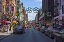 Restaurants and street lights on Mulberry Street in Little Italy