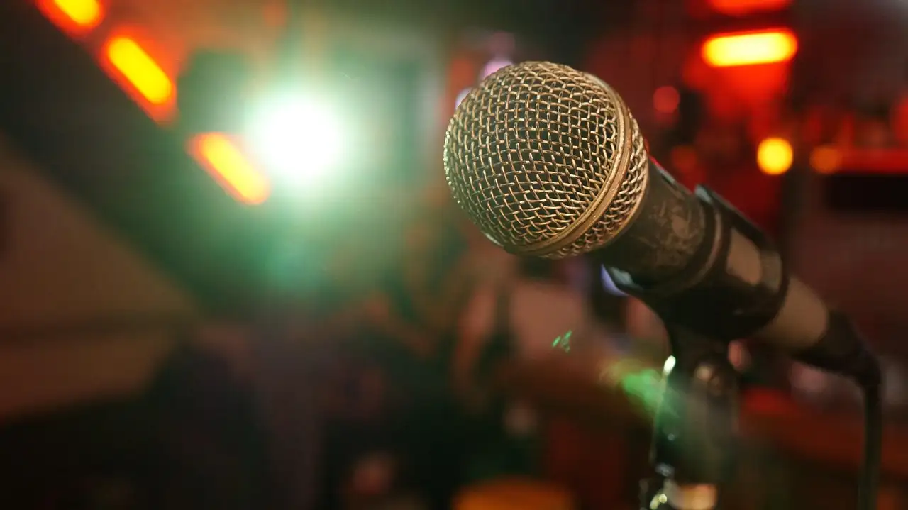 A microphone on a small stage