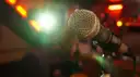 A microphone on a small stage