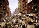 Mulberry Street around 1900: market carts and crowds (historic photochrom)
