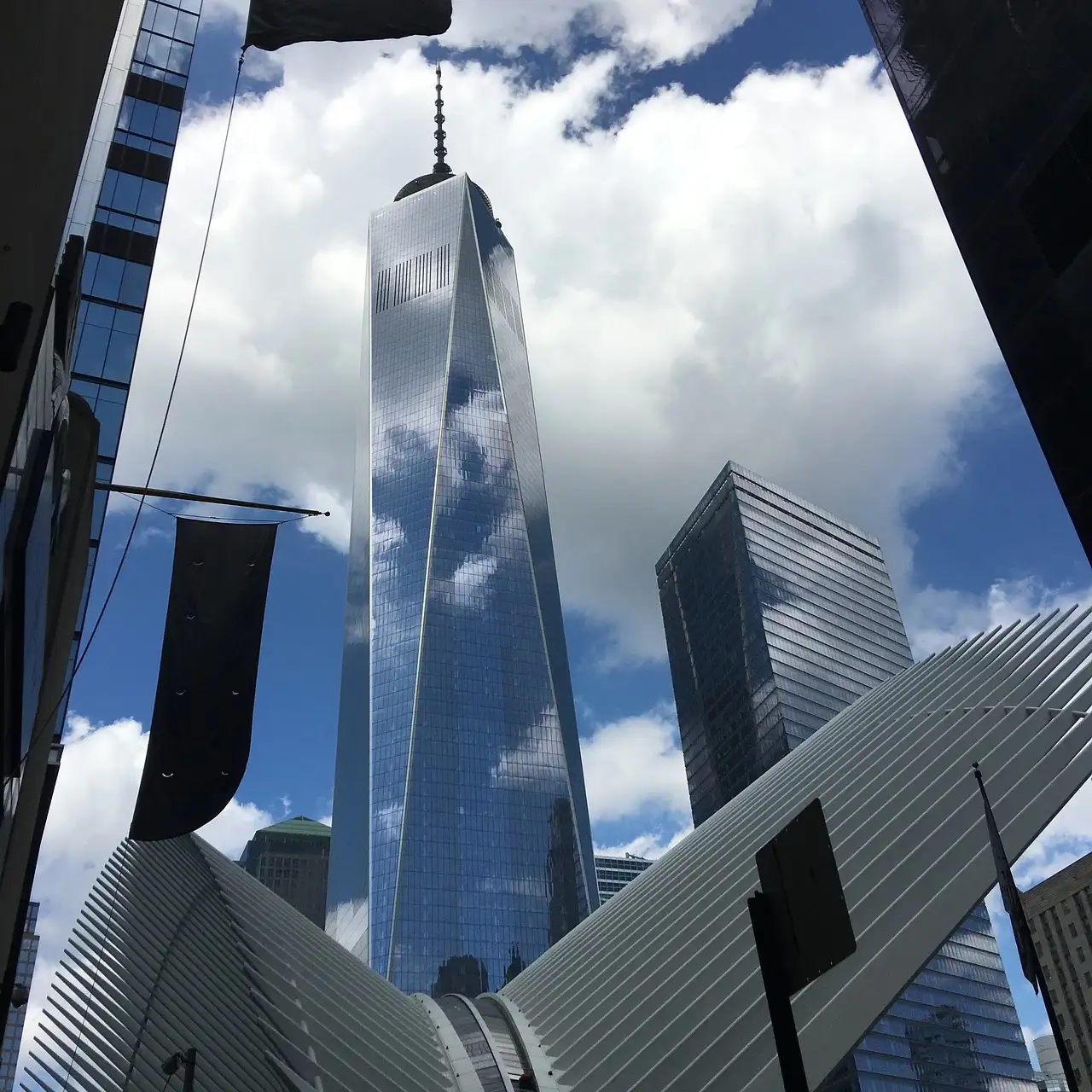 One World Trade Center framed by a wing of the Oculus
