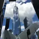 One World Trade Center framed by a wing of the Oculus
