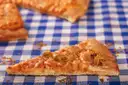 A slice of pizza on a checked cloth