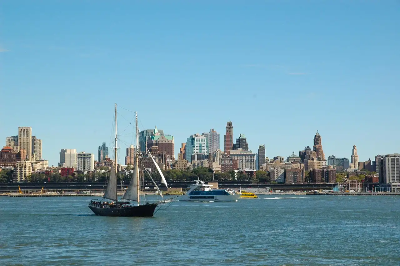 A schooner sailing past Manhattan