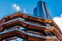 The Vessel's copper steps against blue sky
