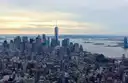 View south over Manhattan to One World Trade Center and the harbour